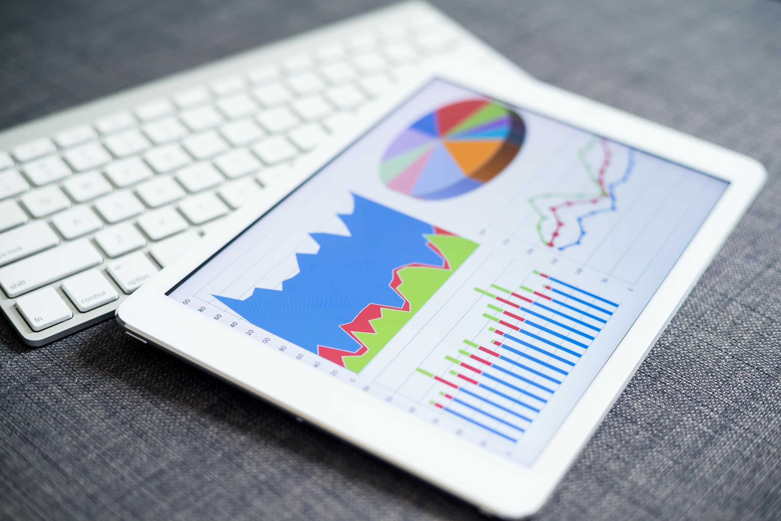 business charts and diagrams on digital tablet 2025 03 25 14 41 34 utc scaled von neugeschaeft GmbH